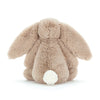 Peluche conejo beige tierno con cola blanca