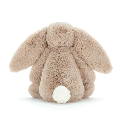 Peluche conejo beige tierno con cola blanca