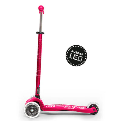 Scooter Micro Maxi Deluxe color rosado con luces LED y manillar ajustable.