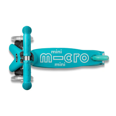 Material resistente y color Aqua del Micro Scooter Mini Micro Deluxe para niños.